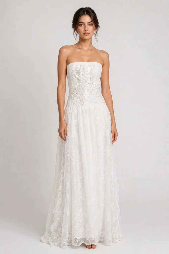 Abito da sposa Paoletta con corpetto plissettato e fiori tridimensionali ricamati a paillettes